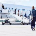 Flight attendant shares hack to carry extra bag for free