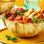 ‘Most delicious way’ with halloumi in a spicy taco bowl – from pan to table in just half an hour – recipe