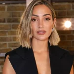 Frankie Bridge’s burgundy Antler suitcase is perfect for packing for Paris Fashion Week