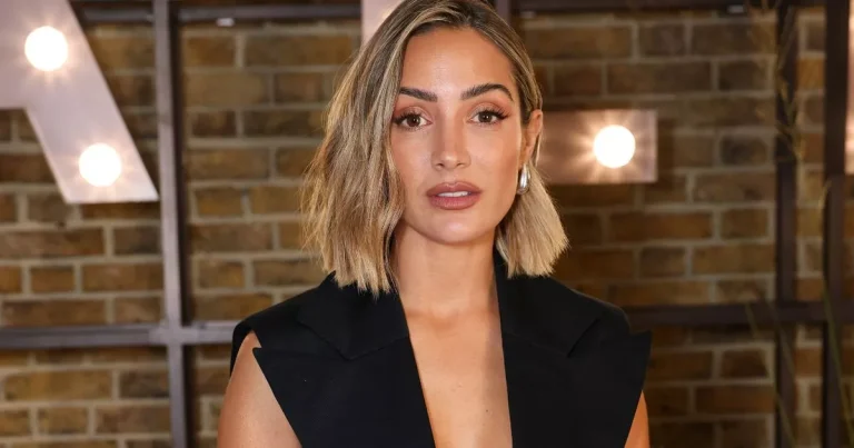 Frankie Bridge’s burgundy Antler suitcase is perfect for packing for Paris Fashion Week