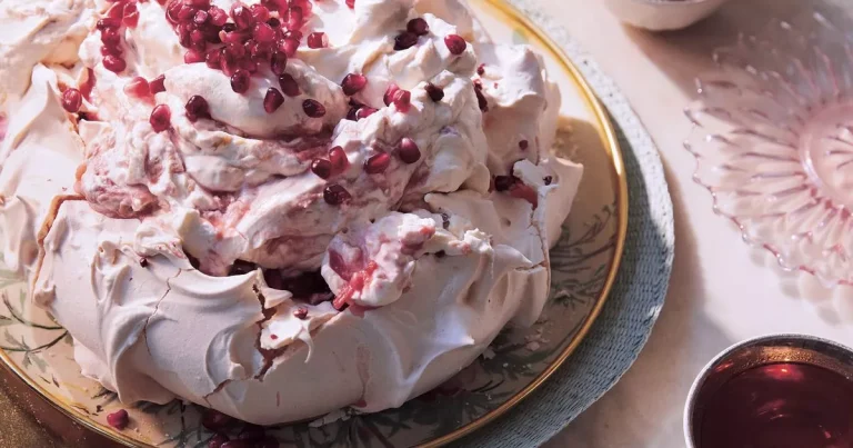 Show your mum some TLC with this delicate rose and rhubarb fool pavlova that’s ‘baked with love’