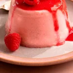 Get that loving feeling with this boozy raspberry panna cotta – perfect for two