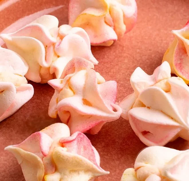 ‘Light and airy’ raspberry ripple meringue kisses – recipe